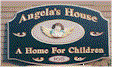 carved sign angela's house