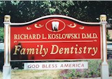 carved sign family denitist