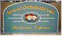 carved sign tortorici orthodontics lab
