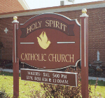 carved sign holy spirit church