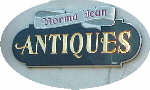 carved sign norma jean antiques