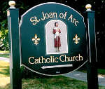 carved sign st. joan of arc